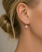 Gigi pearl and diamond earring in 18k yellow gold by ORFÉLIE