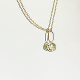 Orfèlie manon pendant and chain in 18k gold with lemon quartz on white background